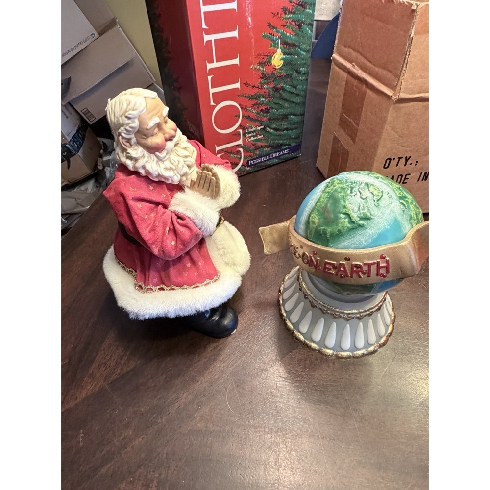 Dept 56 Possible Dreams Clothique 713272 Santa Pray for Peace lights up box